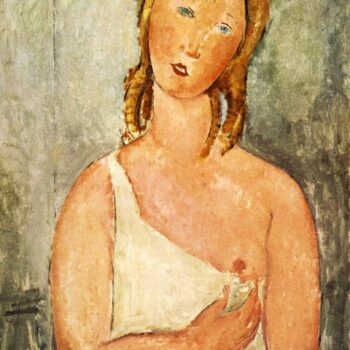1918 Jeune femme rousse en chemise, assise sur un divan