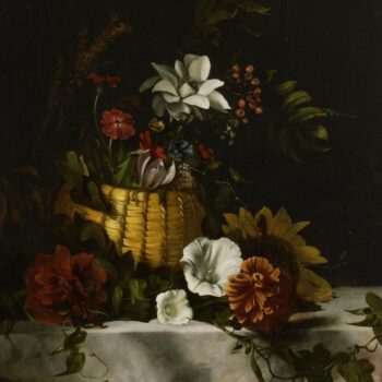 Basket with flowers on marble