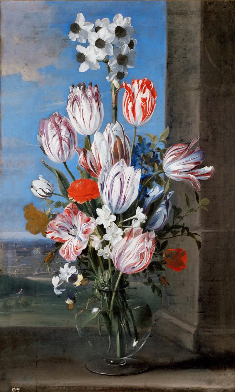Bouquet of flowers in a glass vase on a windowsill - 1609