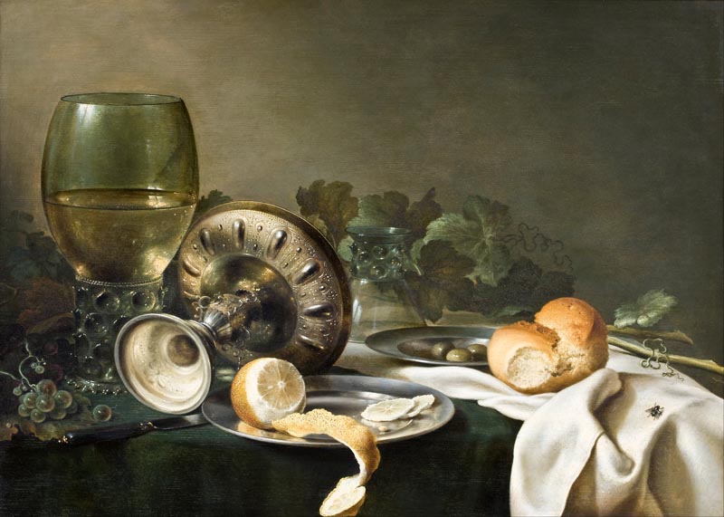 Still life with dishes, bread and lemon