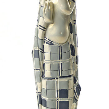 Gertie Schiele in Checkered Cloth by Egon Schiele